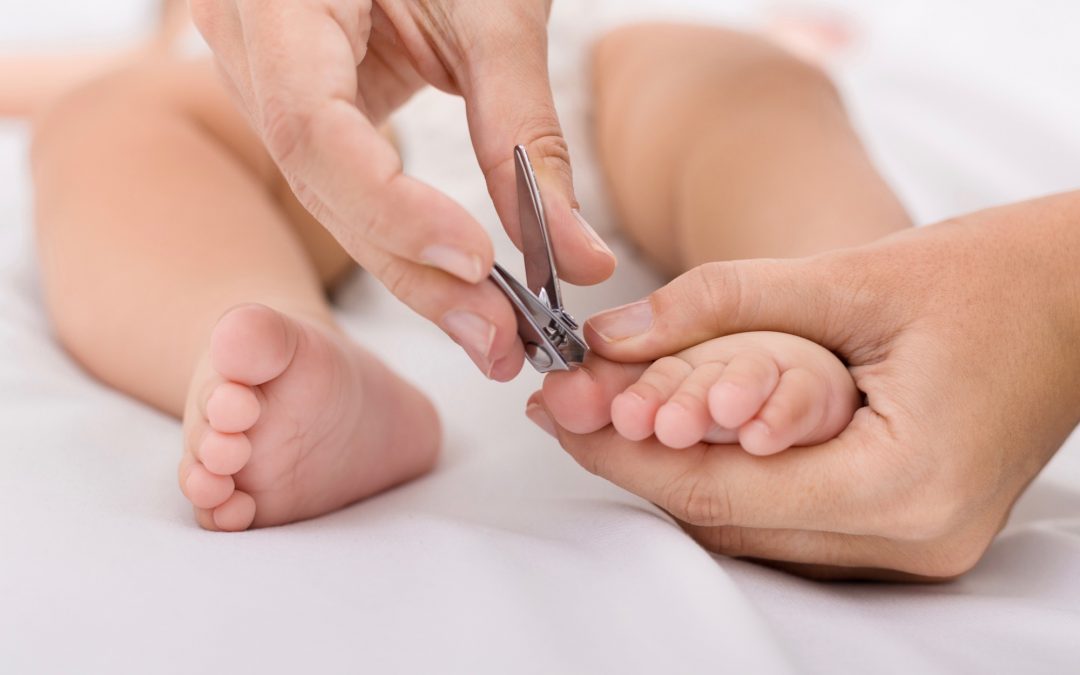 Parent Trimming Baby's Toenails to Avoid Ingrown Toenails