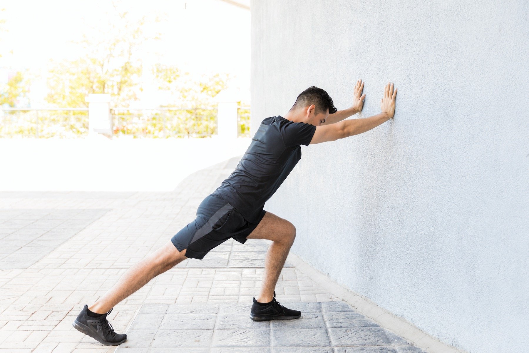 man-getting-rid-of-bone-spurs-through-stretching_afd Man Stretching Calf to Treat Heel Bone Spur